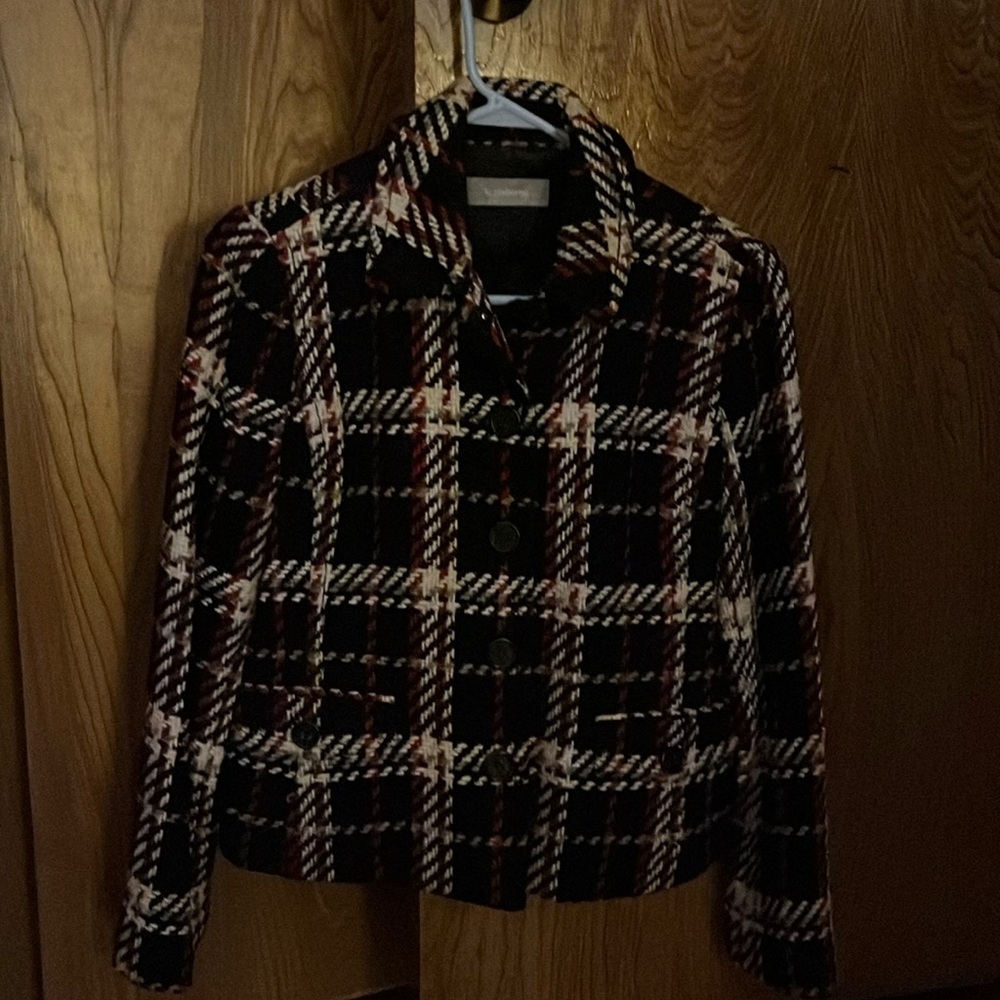 Fun yet classic red, black and white plaid jacket. Dress it up or down!
